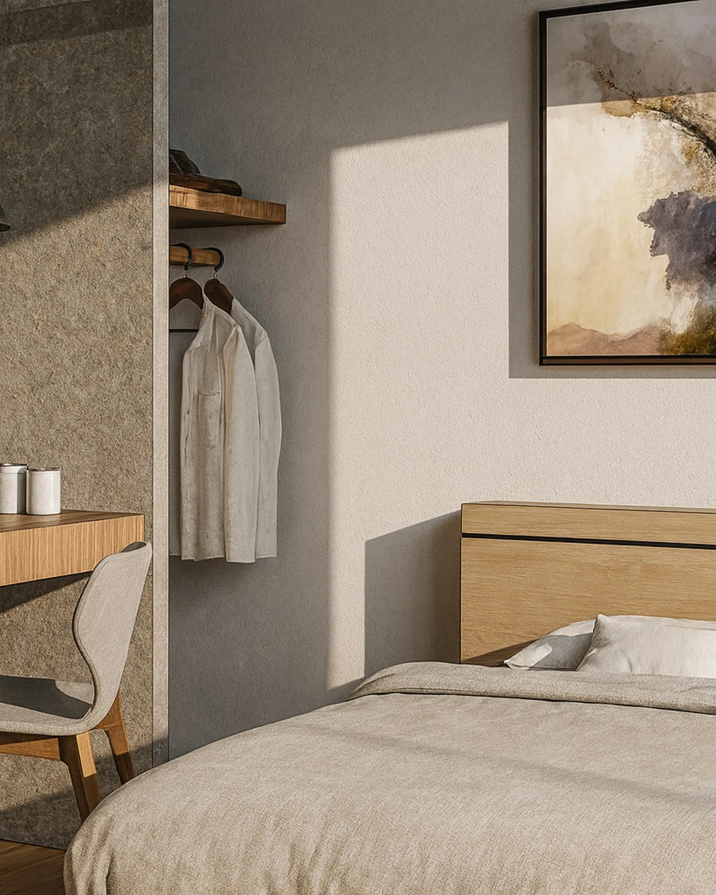 Sunlit bedroom corner with a beige bed, wooden headboard, wall art, and a small open closet with hanging white shirts.