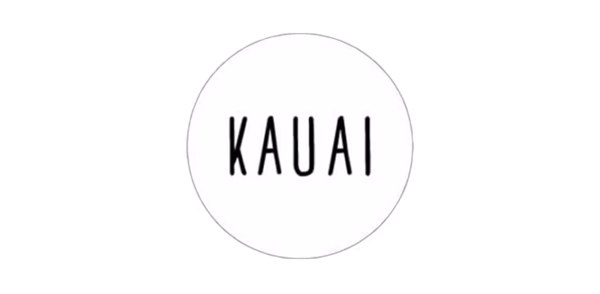 White circle with the word 'KAUAI' in black uppercase letters centered inside.