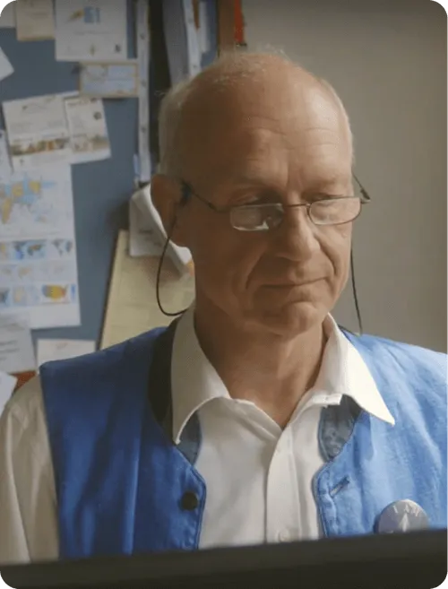 old man with white and blue clothes