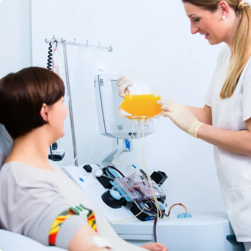 A young woman during the plasma donation process.