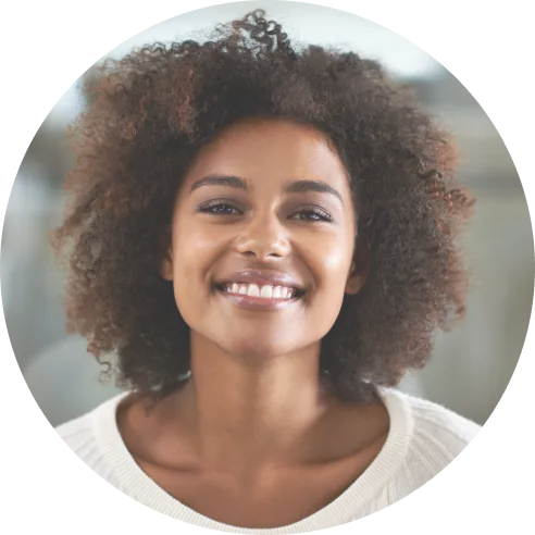 a round picture of a woman smiling