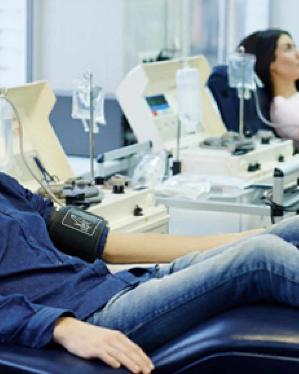 a person with a cast on its arm laying in a chair