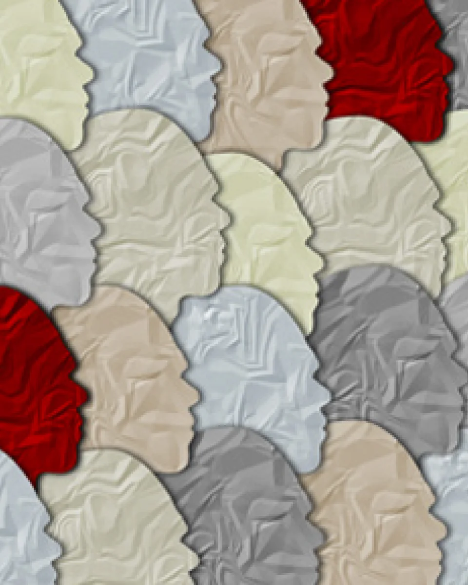A group of different colored paper faces