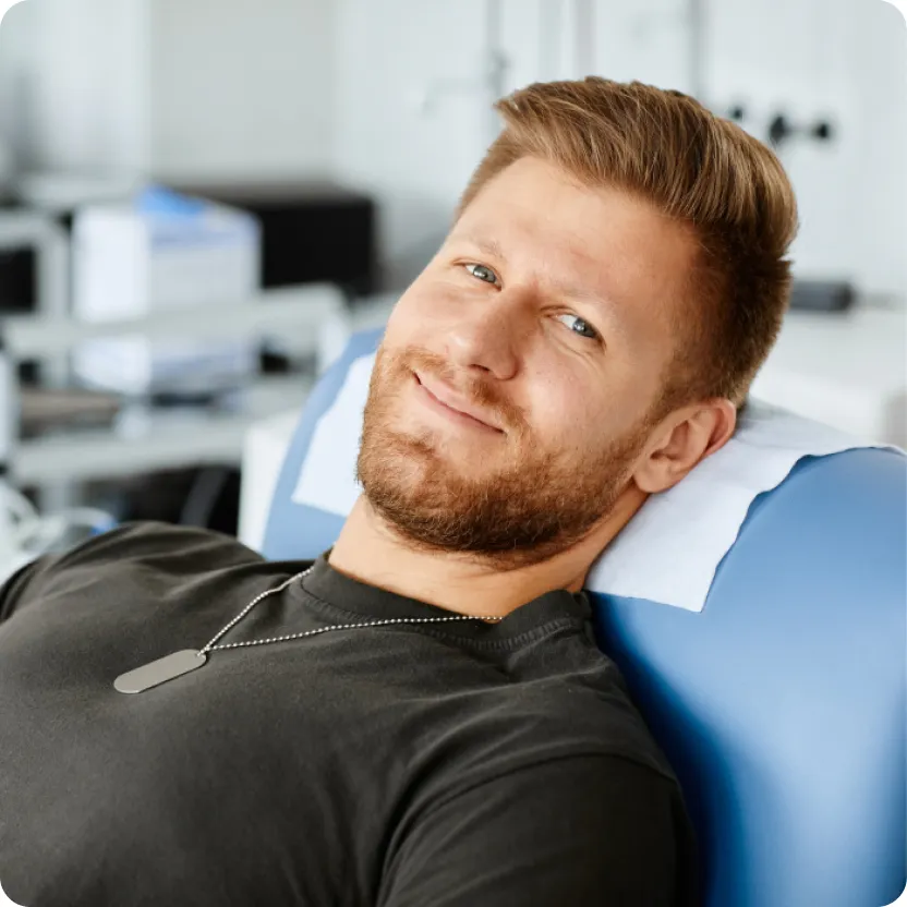 A young man during the plasma donation process.