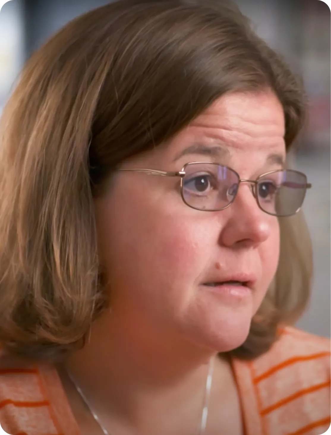 A lady is currently giving an interview.