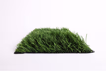 Square patch of thick artificial green grass on a white background.