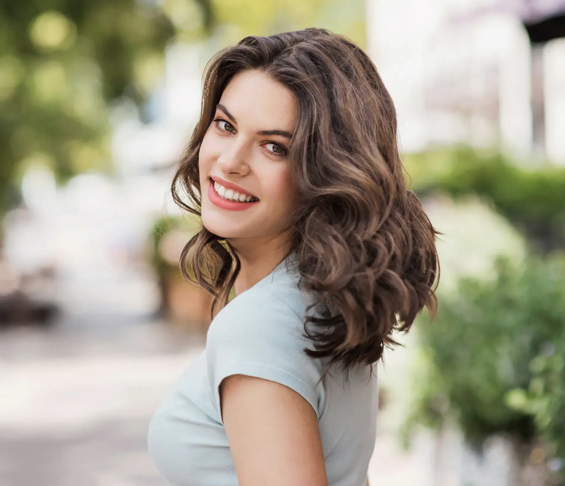 A close up of a person with a smile on their face.