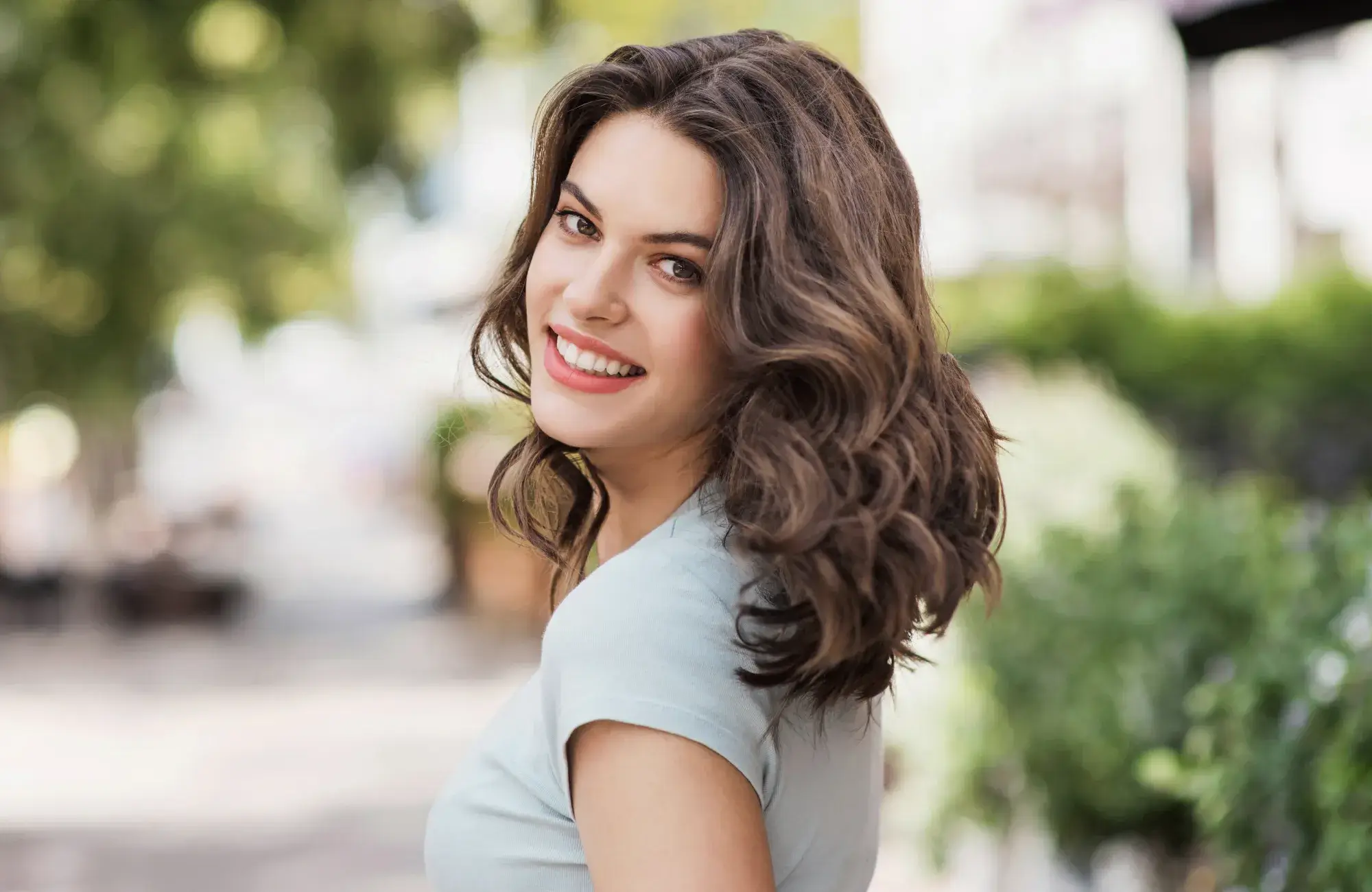 A woman with a smile on her face.