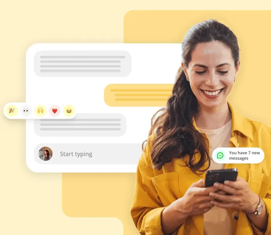 A customer smiles at a message on her phone in a branded customer app