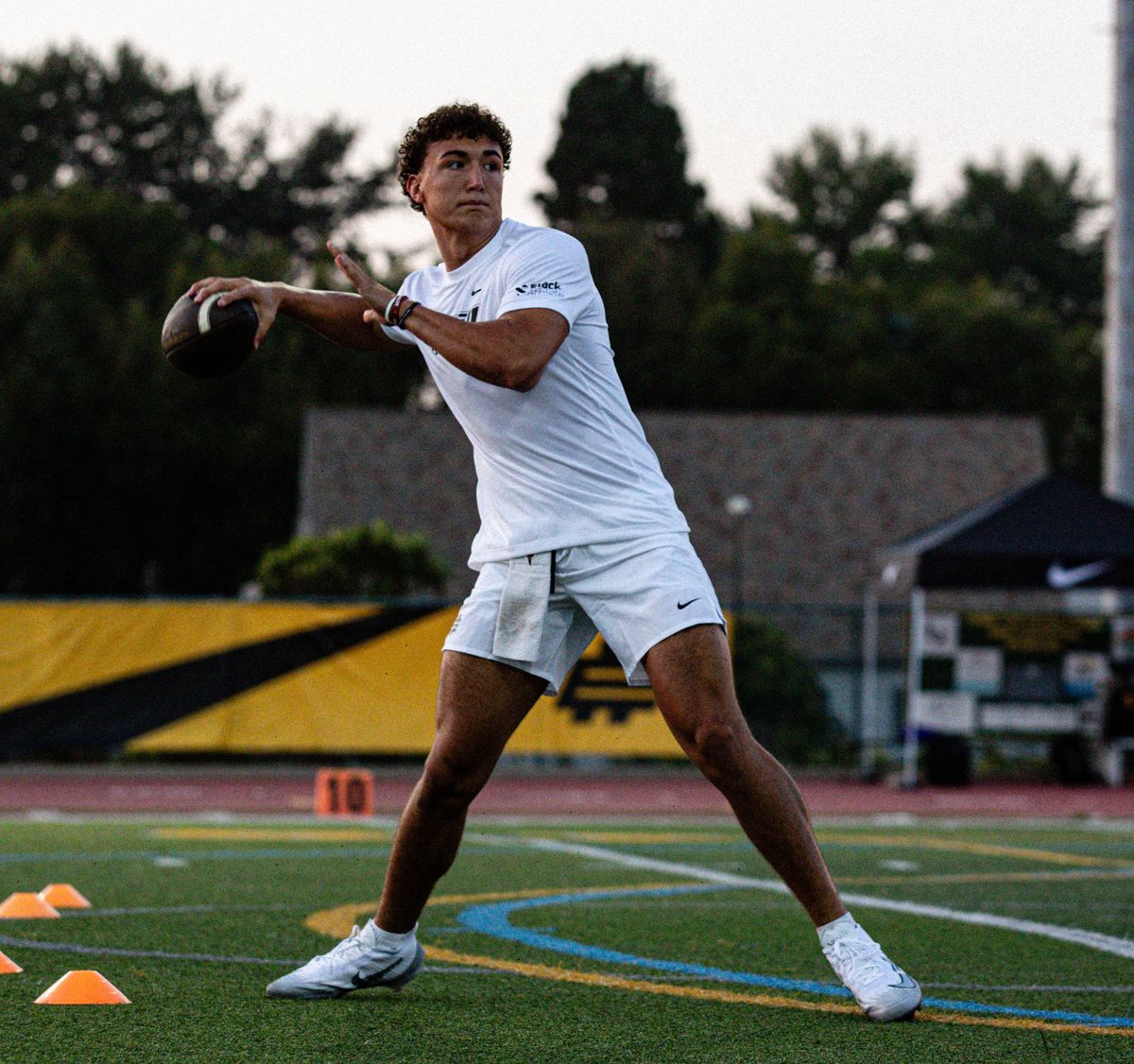 Quarterback setting to throw during a practice drill