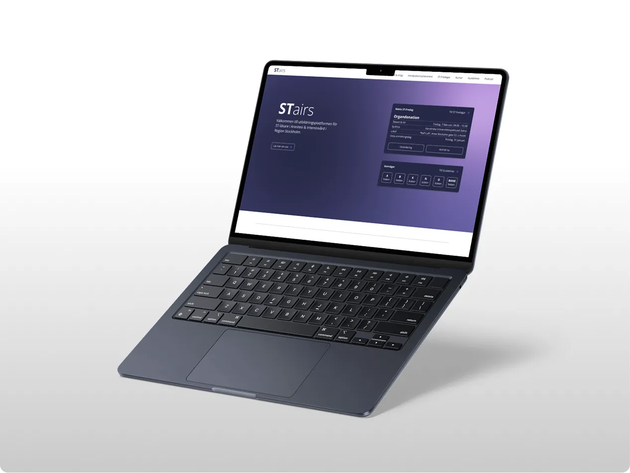 Open laptop displaying the redesigned STairs website in a purple UI theme, featuring the login form on the home screen.