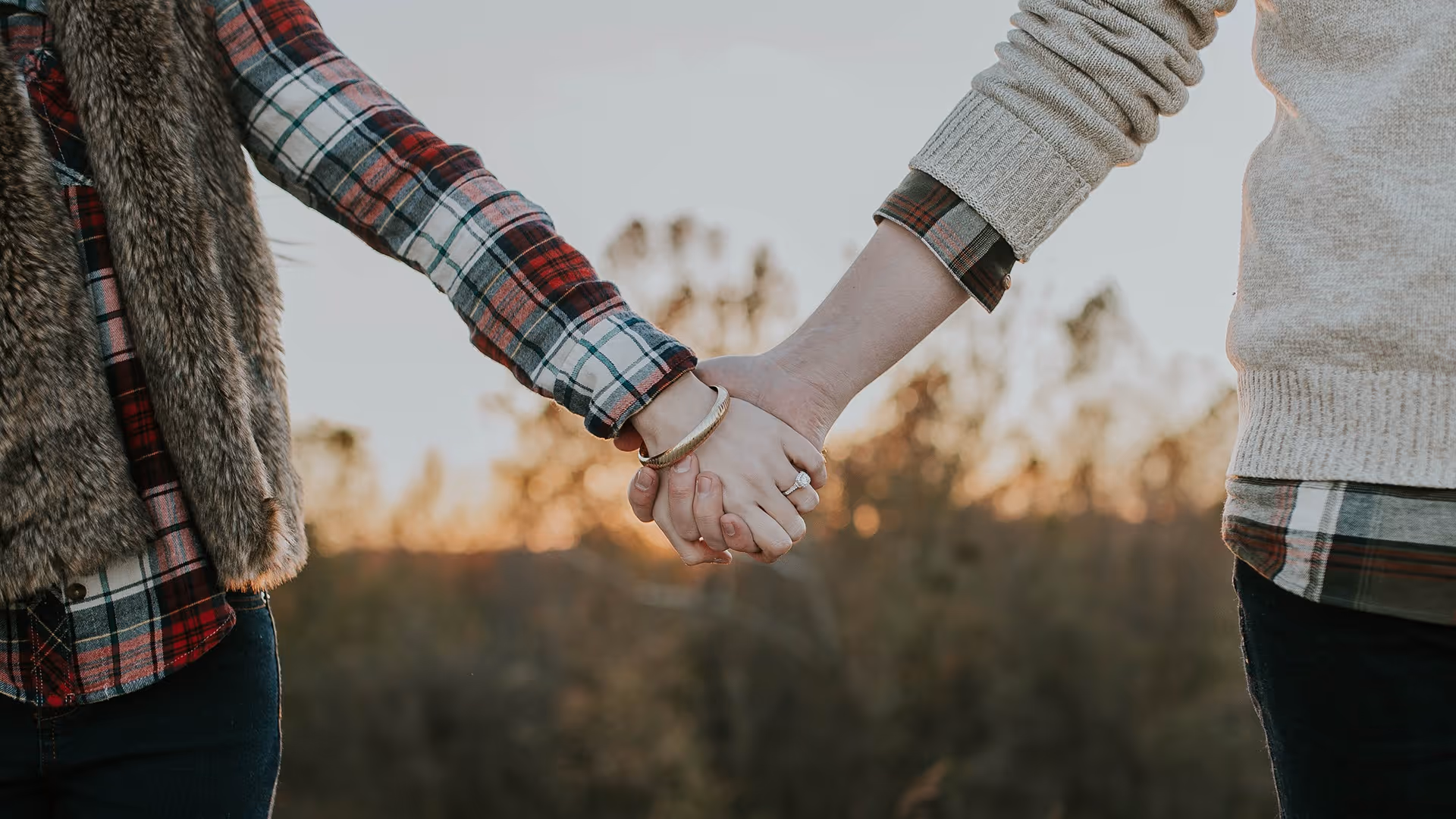 Couple holding hands
