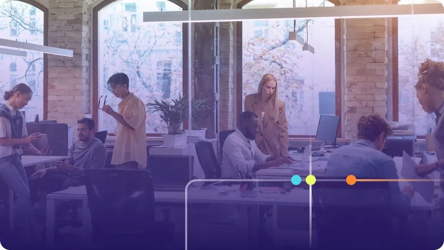 Diverse team working together in a modern open-plan brick-walled office with a purple overlay