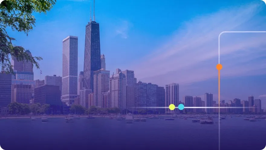 Chicago lakefront skyline at sunset with the Hancock tower and boats in the harbor