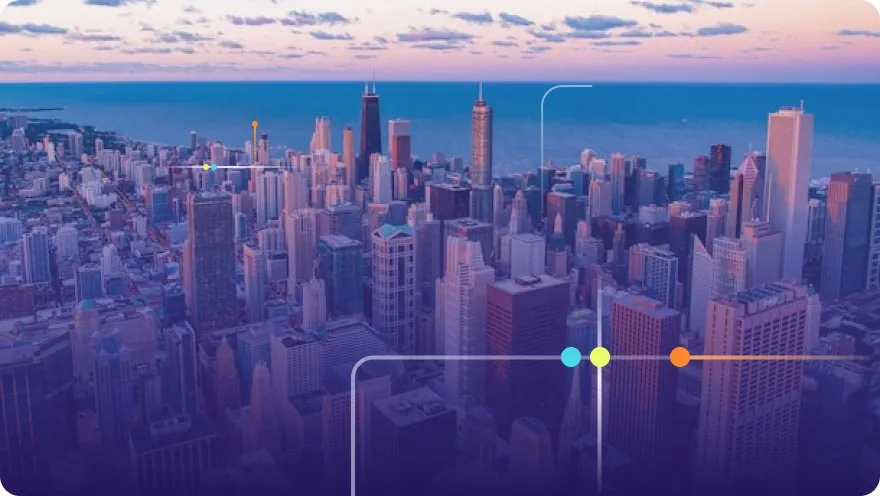 Aerial panoramic view of the Chicago skyline and Lake Michigan at dusk