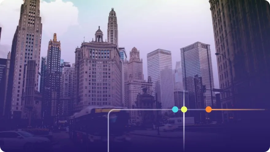 Chicago downtown street view with tall skyscrapers and a bus passing through