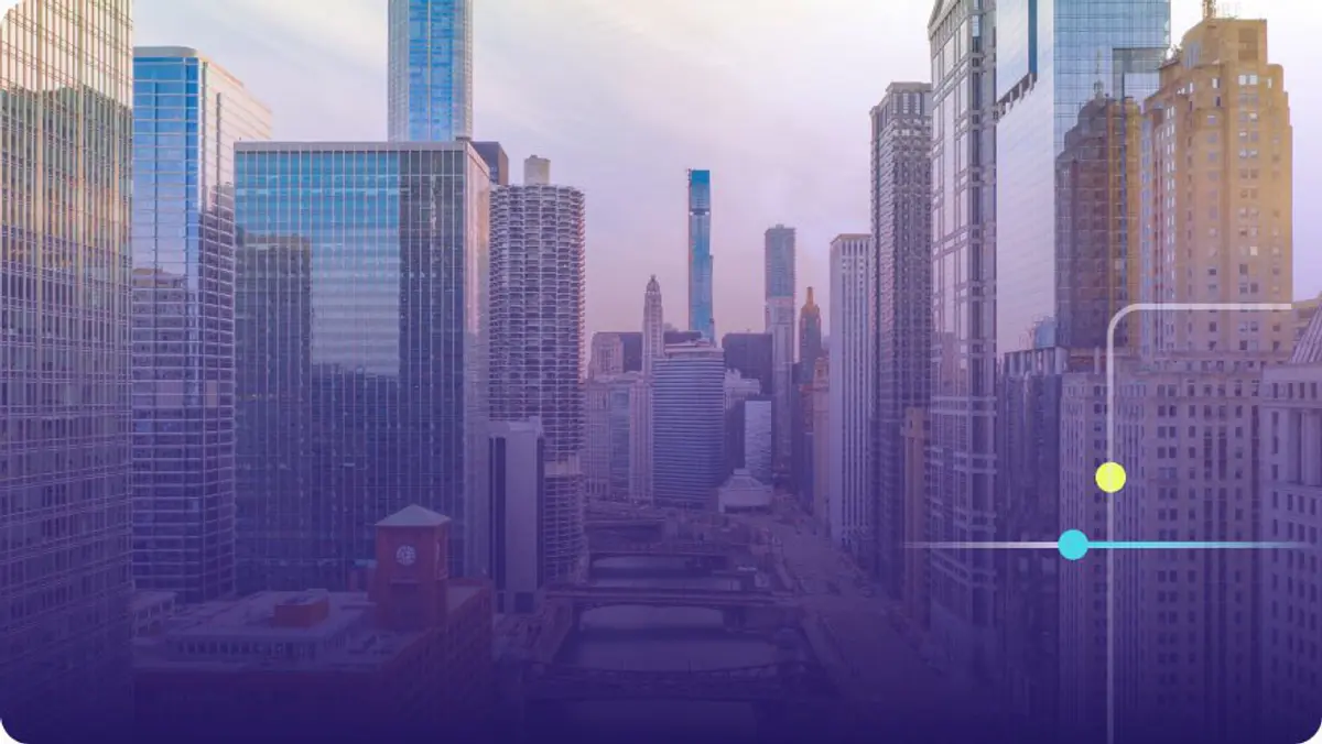 Chicago skyline with skyscrapers along the river under a hazy sky with purple overlay