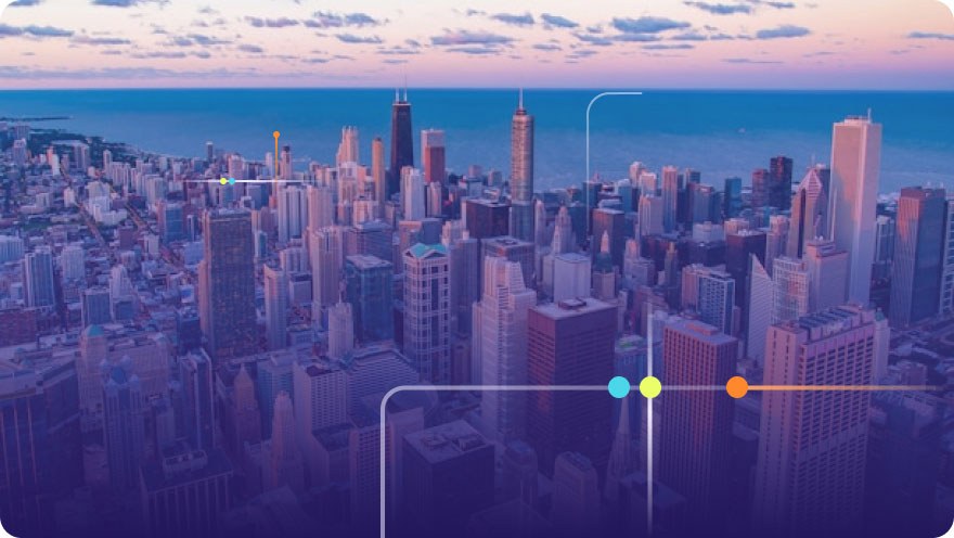 Aerial panoramic view of the Chicago skyline and Lake Michigan at dusk