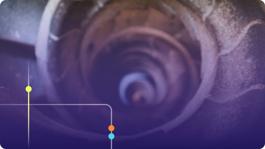 Spiral staircase viewed from above with purple overlay and Focused brand graphic elements