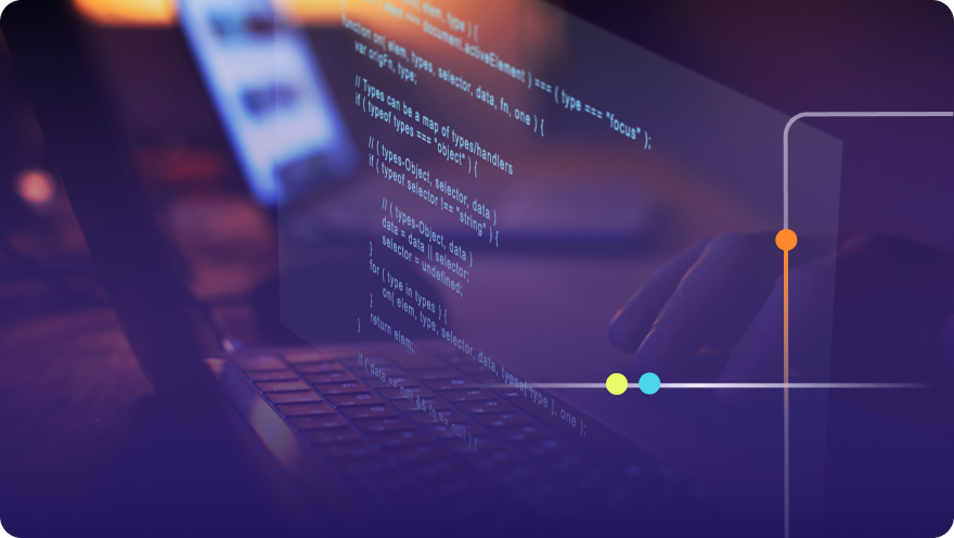 Close-up of a laptop screen displaying lines of programming code in a dark editor