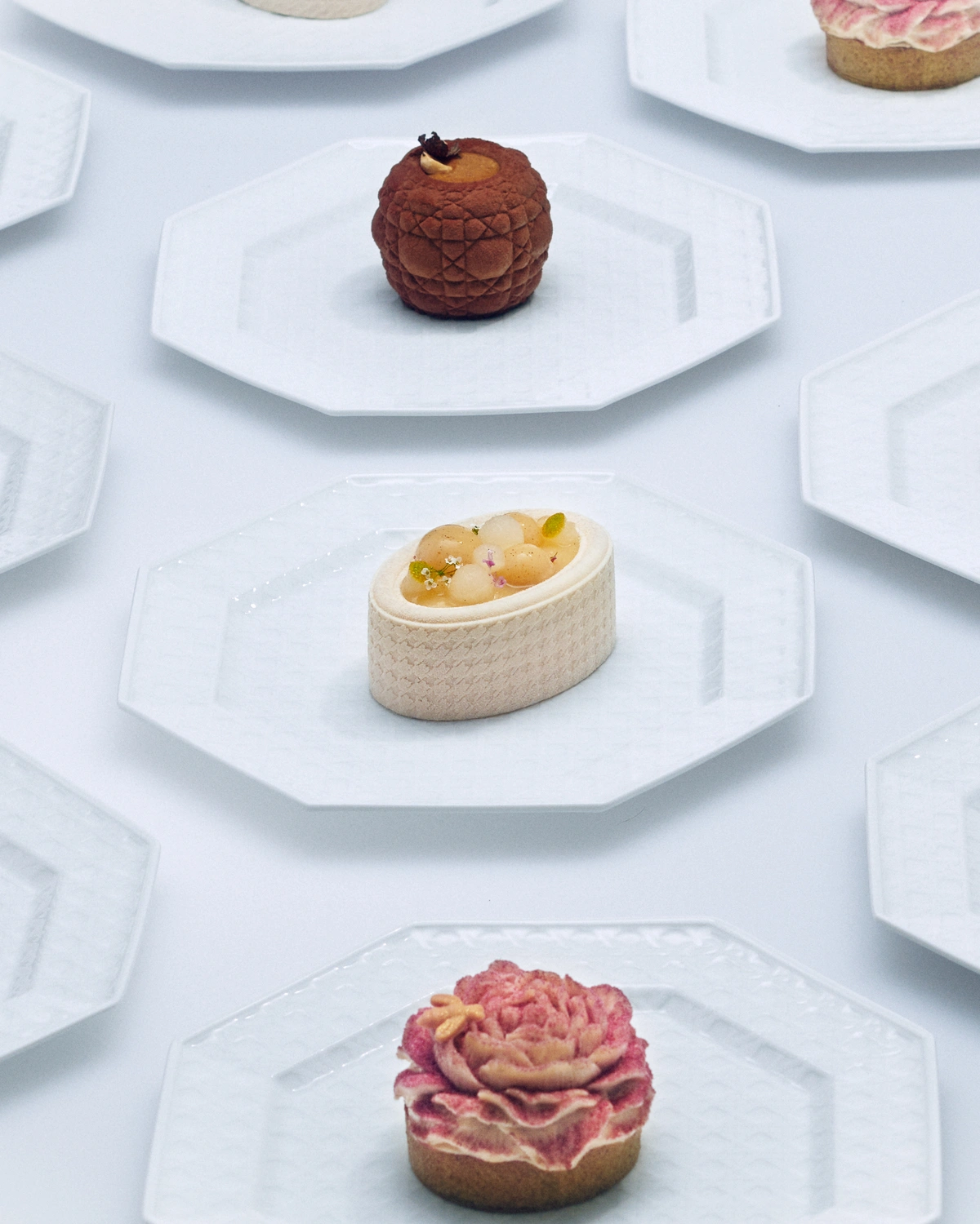 Selection of signature pastries from Café Dior presented on Dior plates
