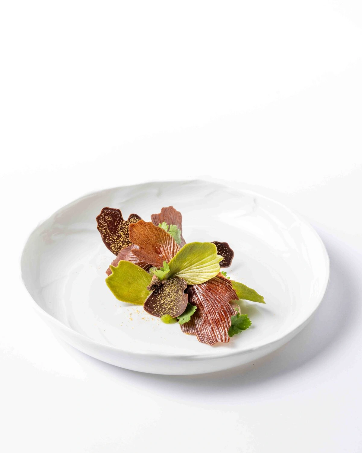 Plat gastronomique présenté au Cristal Room by Anne-Sophie Pic à Hong Kong