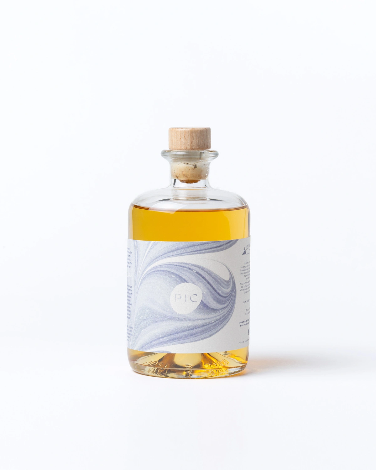 Eleganter Flakon einer handwerklichen flüssigen Kreation mit Korkverschluss, erhältlich in der Boutique Pic.