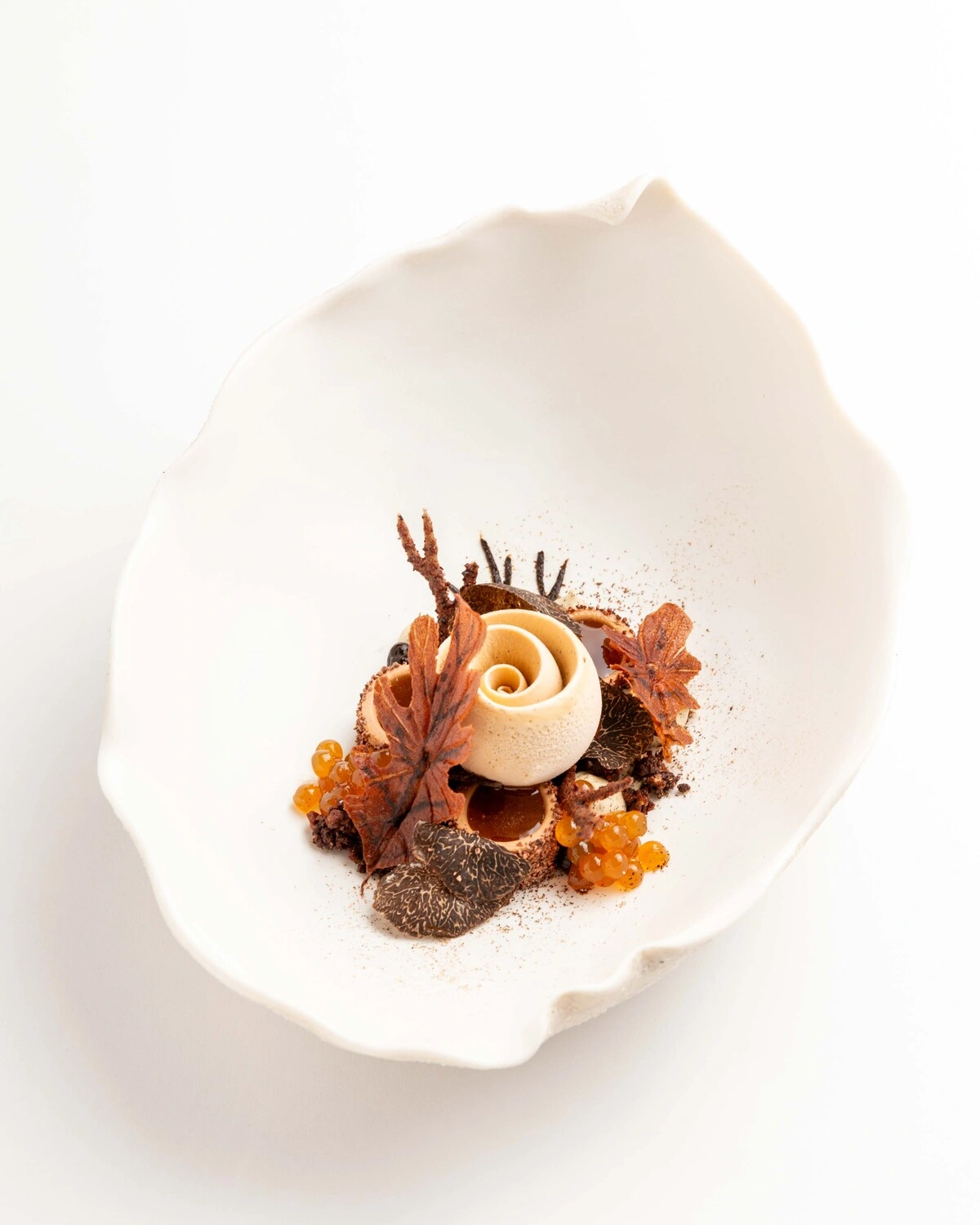 Harmonie de produits nobles et de saveurs boisées, une création culinaire de haut vol.