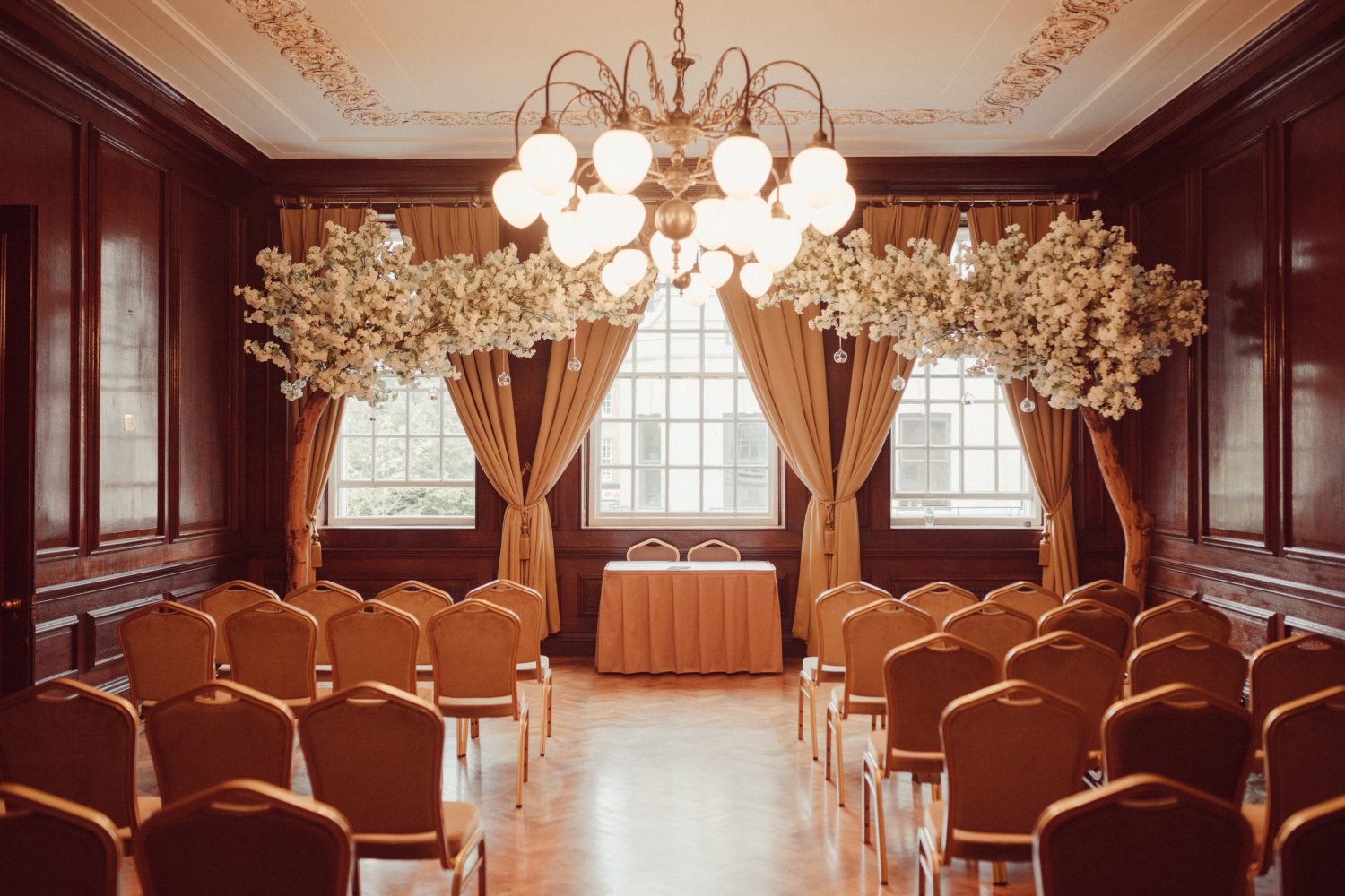 Drawing Room at Manchester Hall featuring extensive original oak panelling and traditional decor