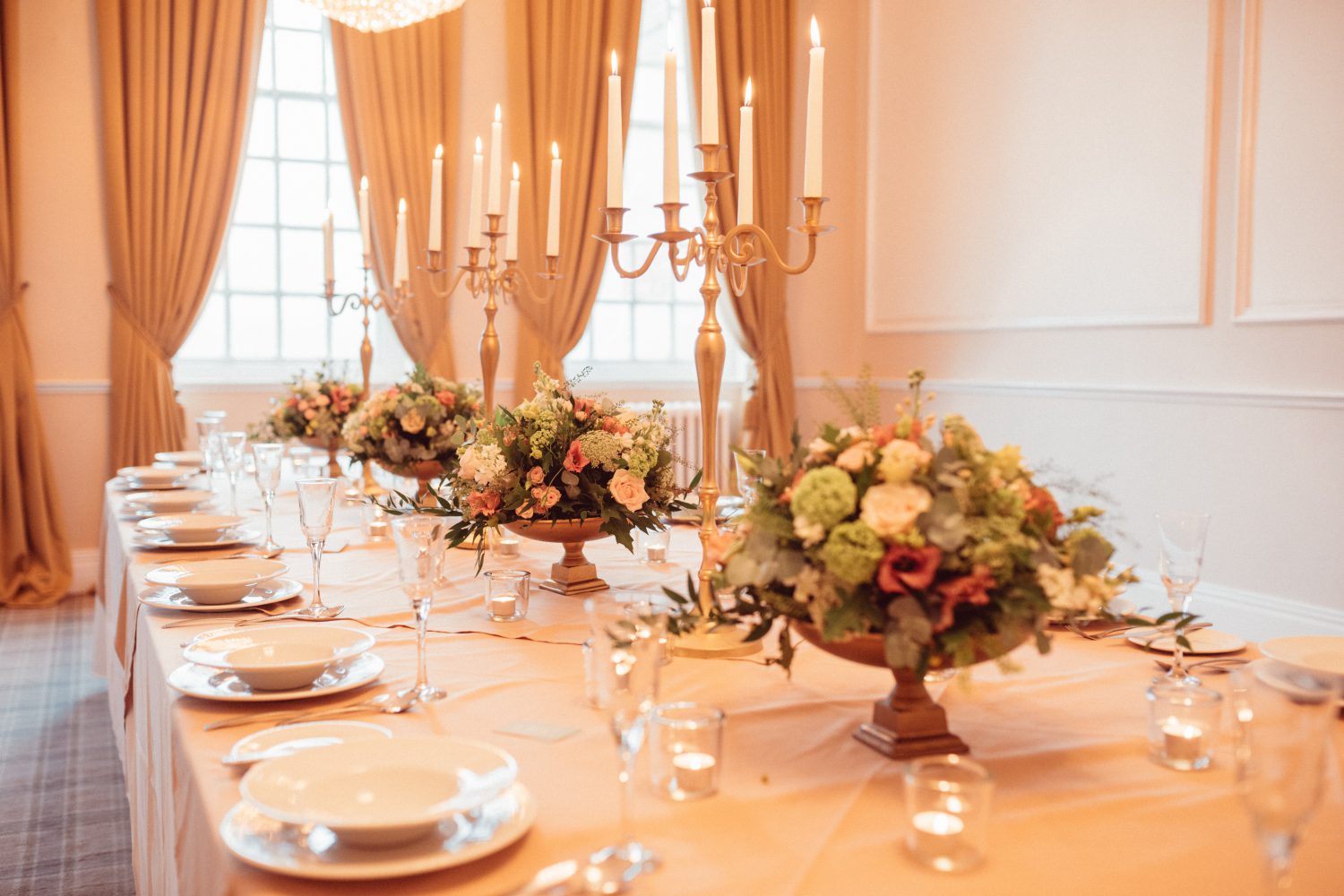 The Lounge at Manchester Hall with original 1929 chandeliers and large period windows