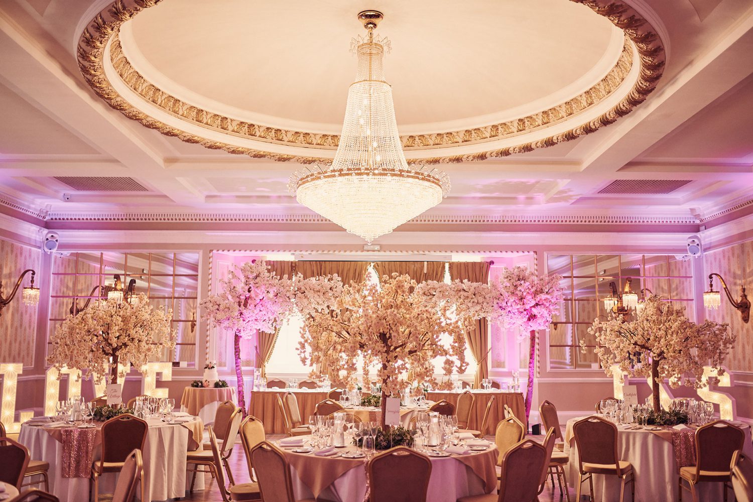 Goulburn Dining room set for large wedding reception with mirrored walls and parquet floor