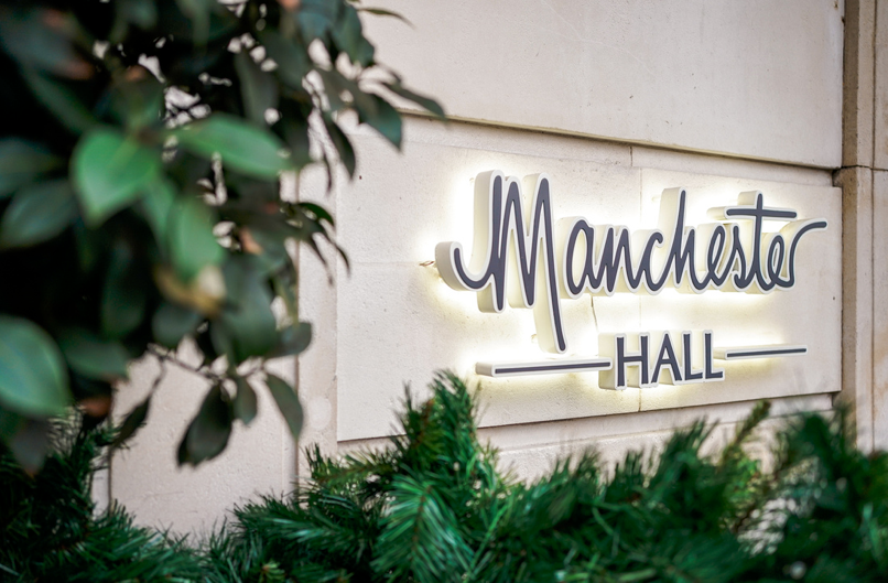 Manchester Hall Library set for private dinner with historic backdrop