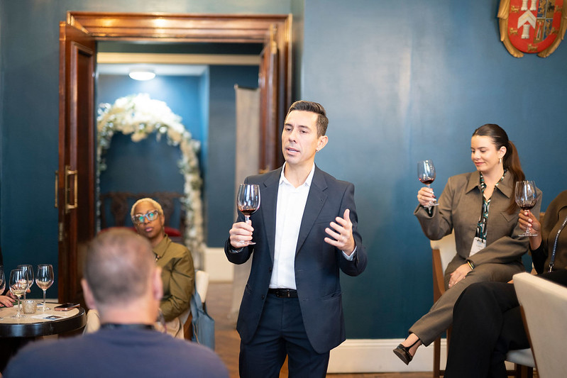 Business meeting in oak-panelled room at Manchester Hall