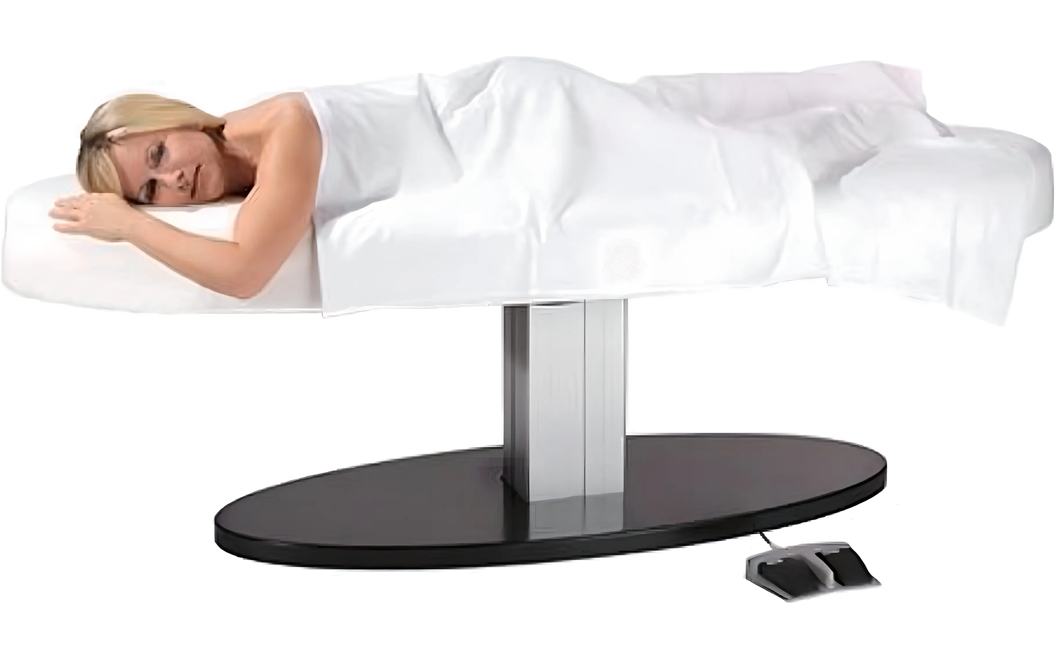 Modern medical diagnostic machine with a monitor and control panel connected to a circular examination table.