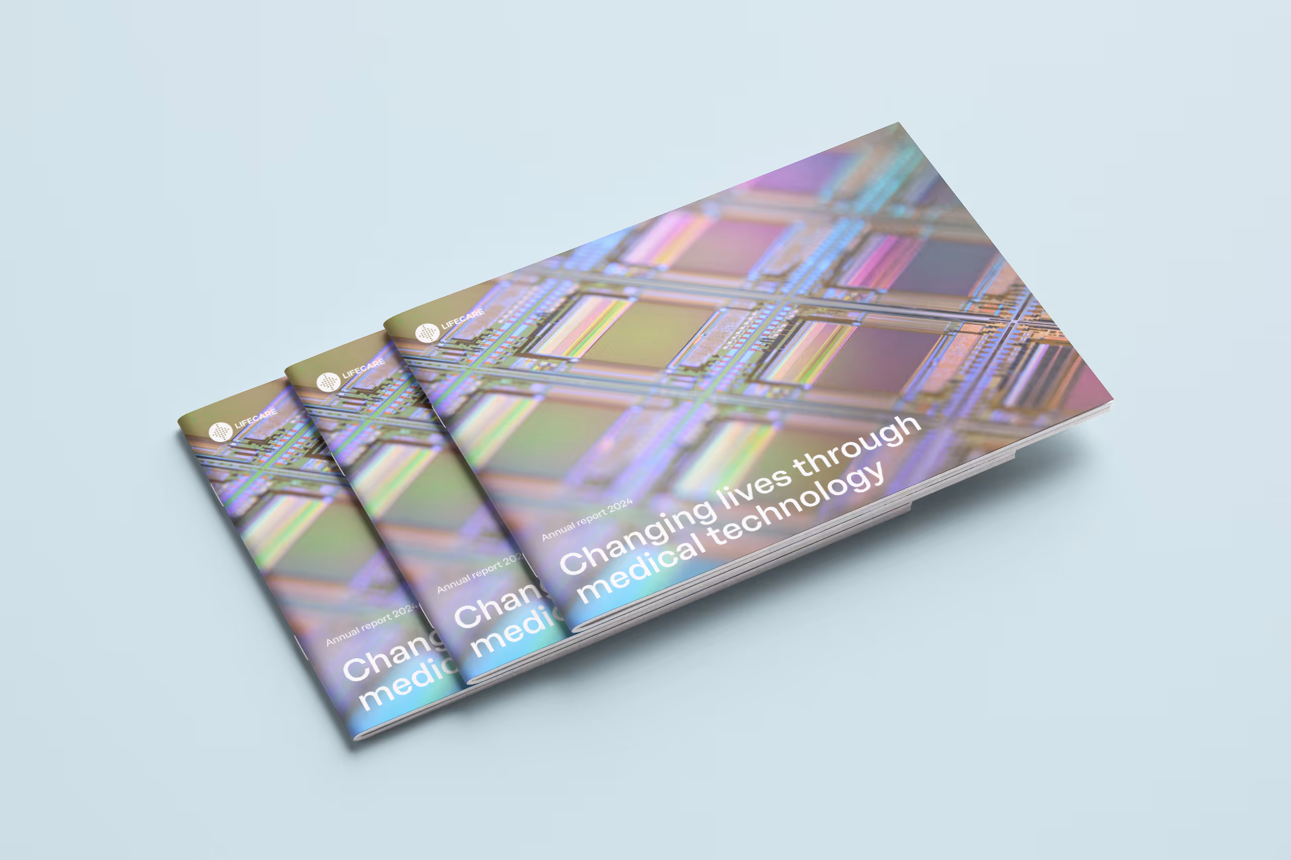 Three annual reports stacked on each other showing covers of Lifecare's annual report 2024