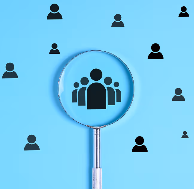 White miniature figures standing on a dark blue circuit board pattern symbolizing human connectivity in technology.