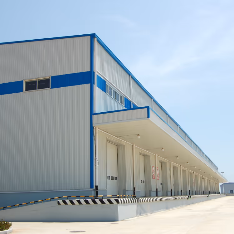 Three hands pointing at wooden puzzle pieces laid out on a desk with charts and graphs.