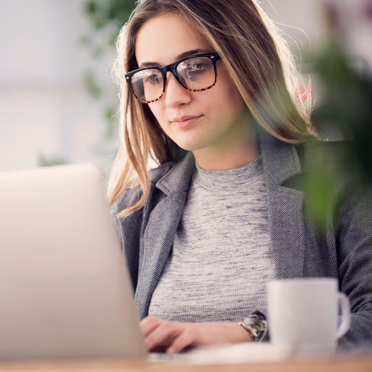 Blue and white spherical nodes connected by curved wires against an orange background.