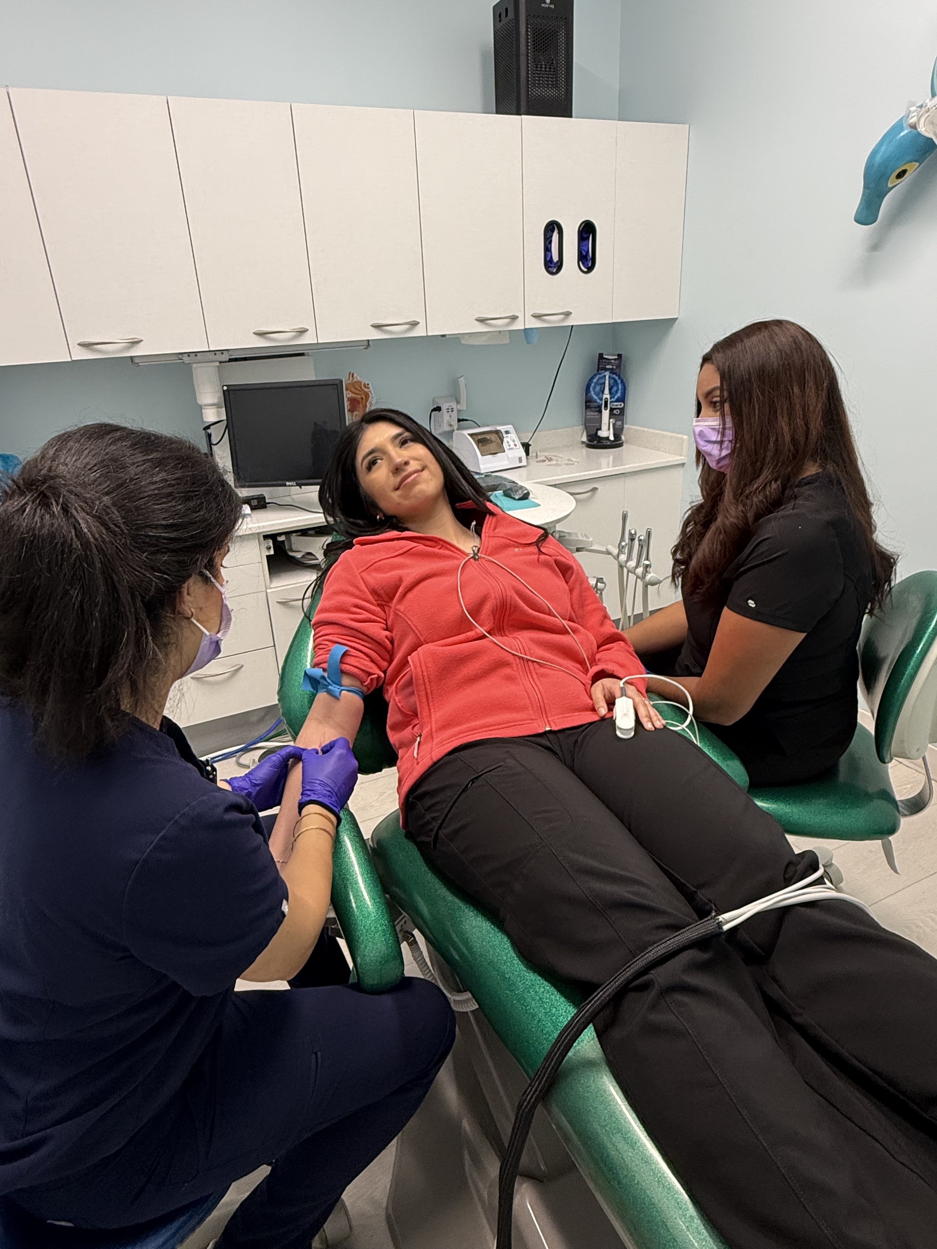 image of a dentist with a patient
