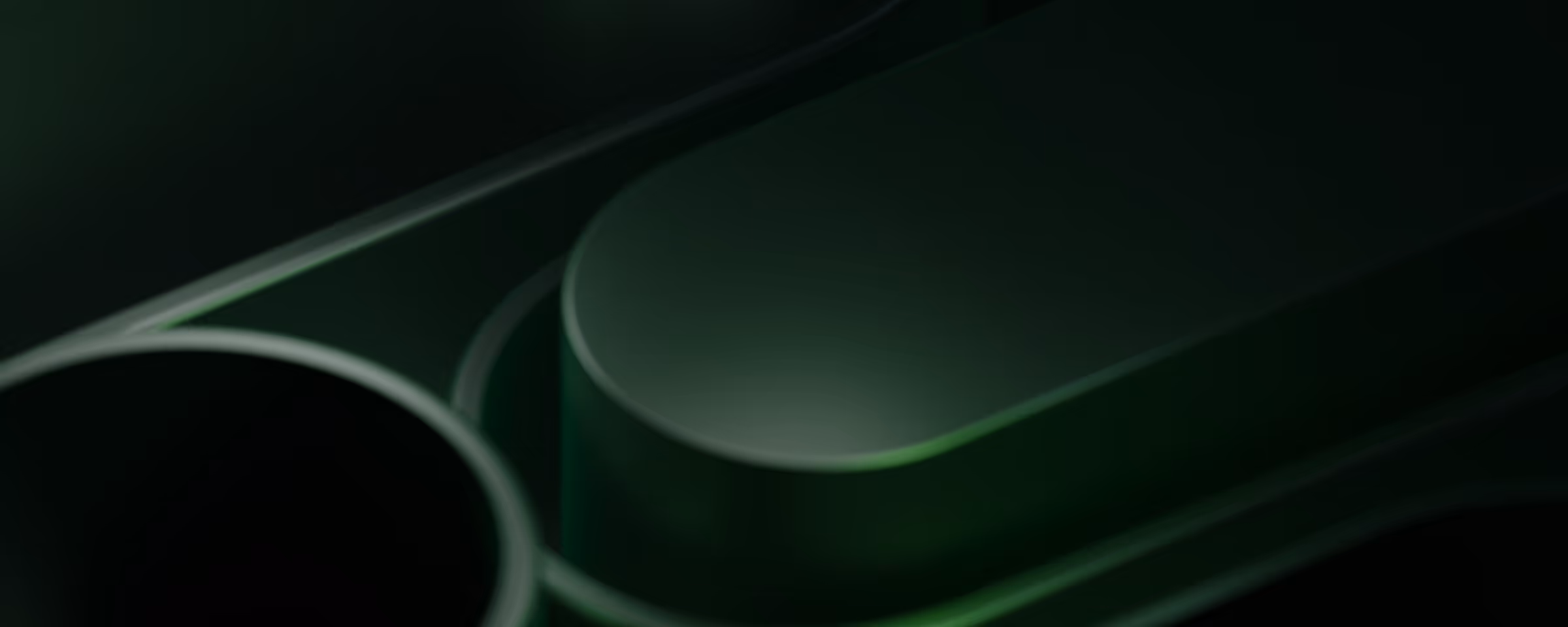 Dark green abstract geometric shapes with rounded edges and soft lighting.