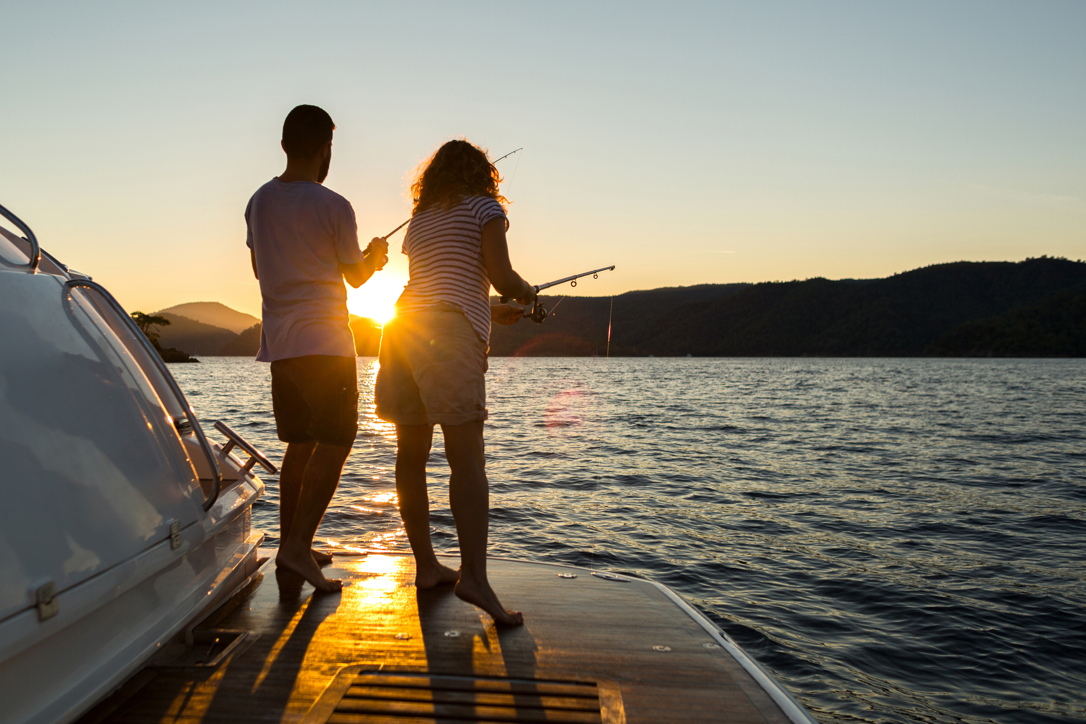 A Young Couple Fishing at Sunset near Islamorada, FL