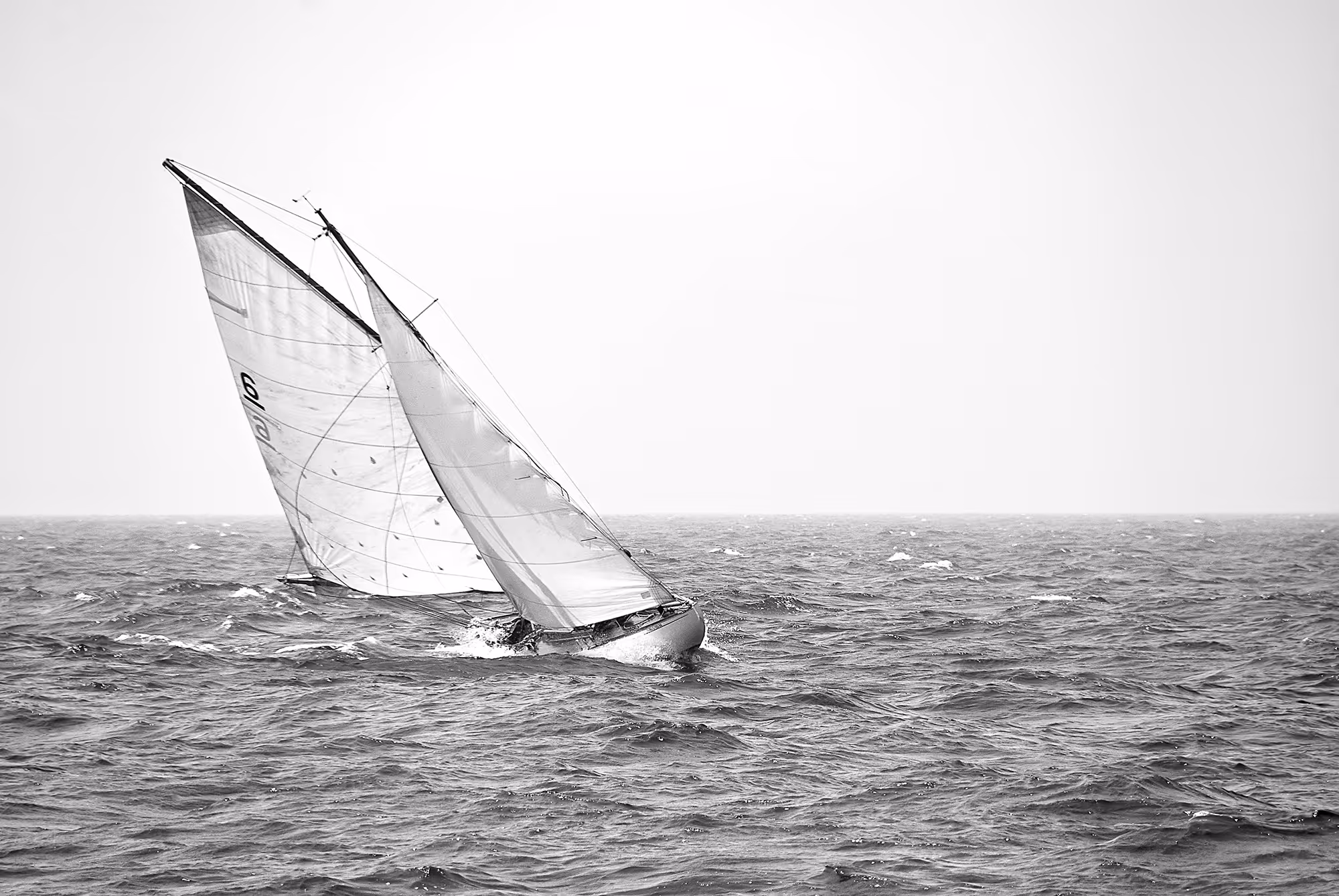 Vintage black & white photograph of a sailboat race in Newport