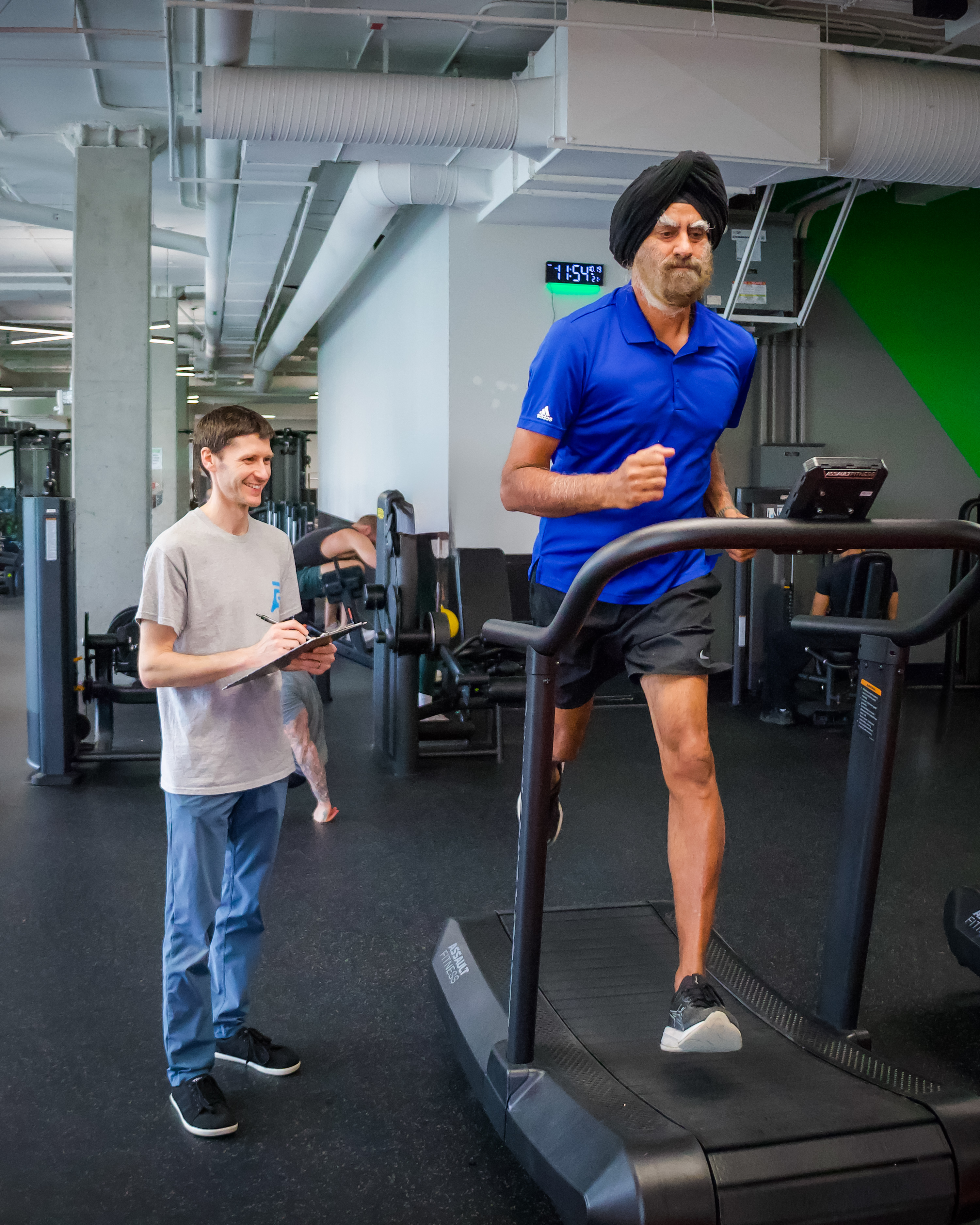 A physiotherapist assessing a patient's gait pattern