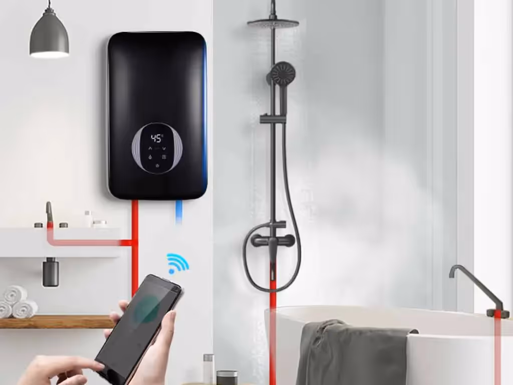 Person controlling a black tankless water heater with a smartphone in a modern bathroom featuring a shower and bathtub.