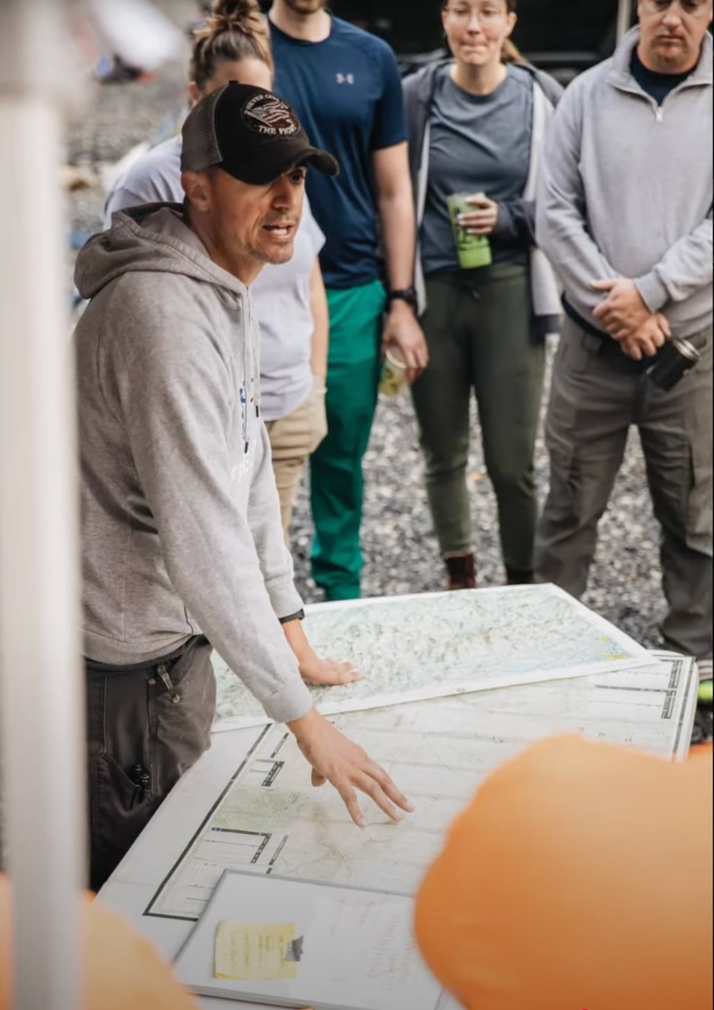 image of educational workshops in progress at an environmental conservation nonprofit, showcasing collaborative stonework projects