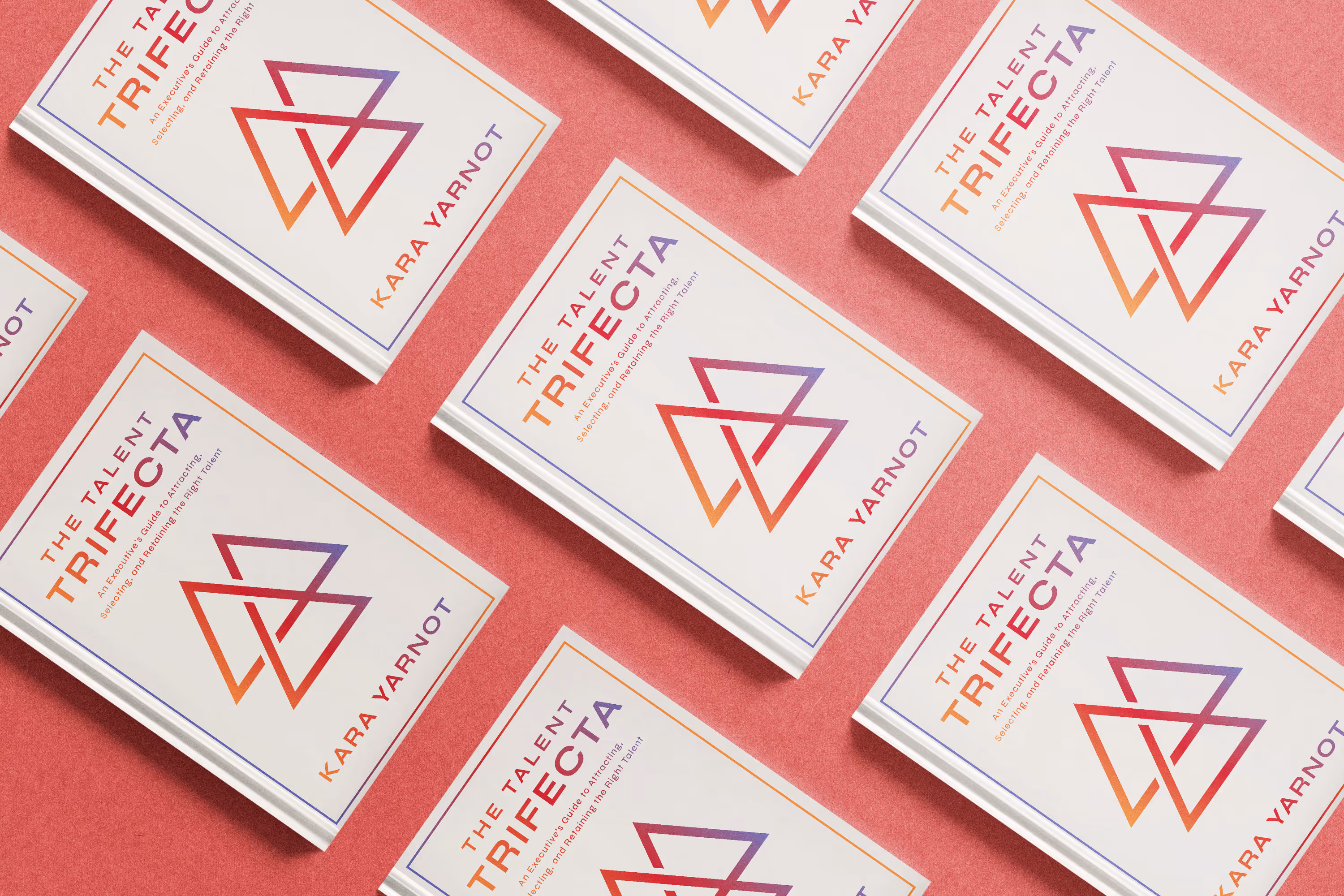 Multiple copies of the book 'The Talent Trifecta' by Kara Yarnot with a white cover and geometric logo on a pink background.