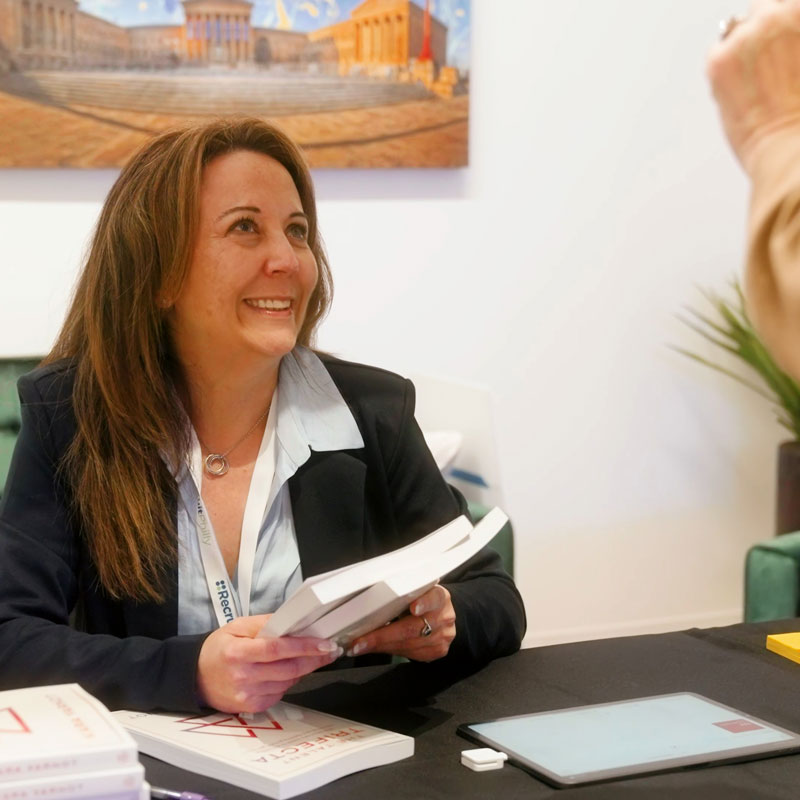 Kara Yarnot speaking with customer