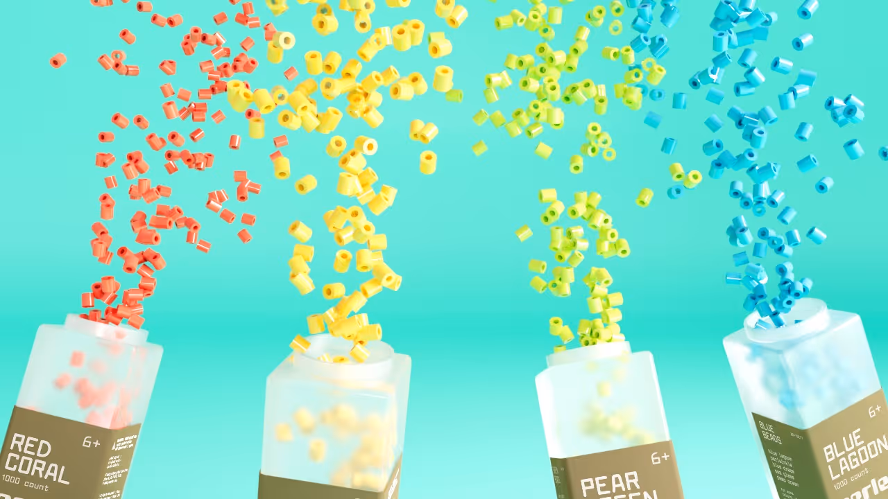 A render of Perler beads spilling out their containers in a rainbow fountain.