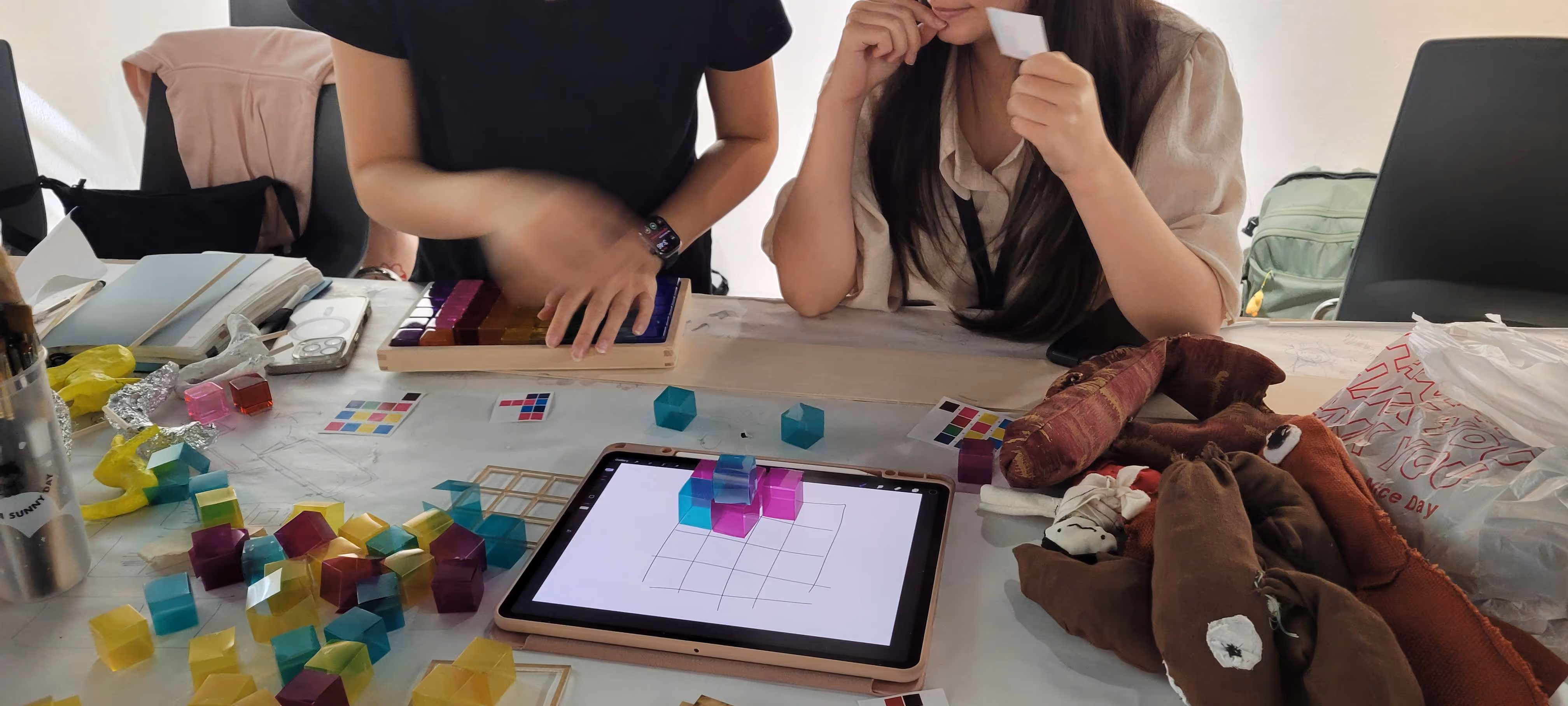 People playtesting a prototype of Black is Key.