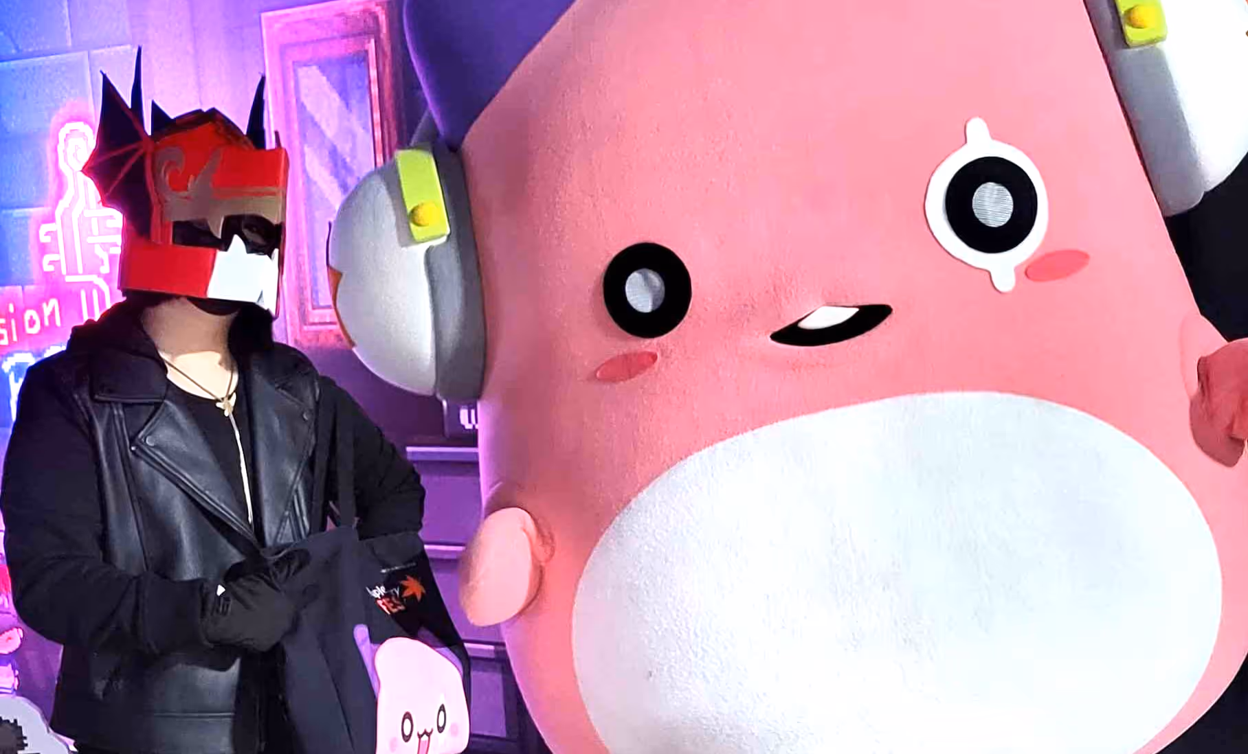 Me posing with the helmet, alongside Pink Bean from MapleStory.